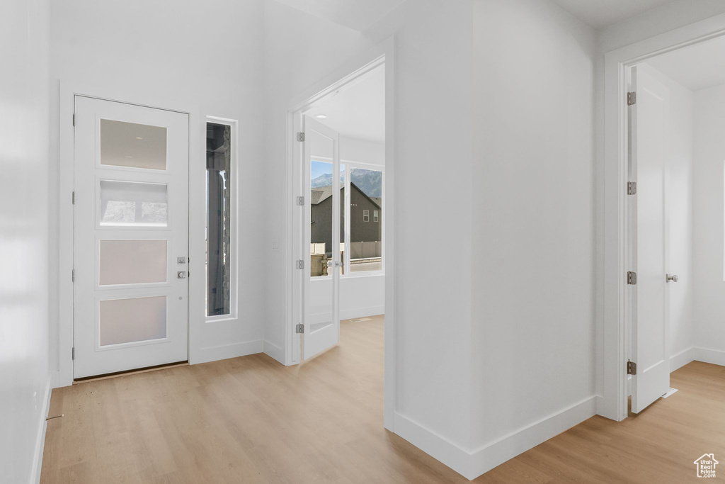 Hallway featuring light hardwood / wood-style floors