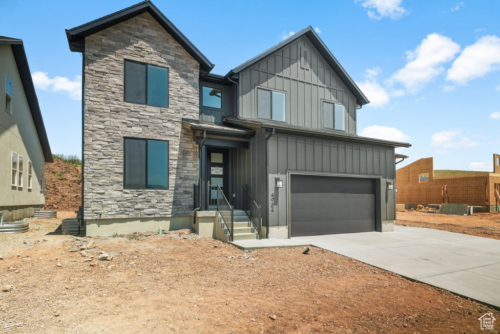 View of front of house with a garage