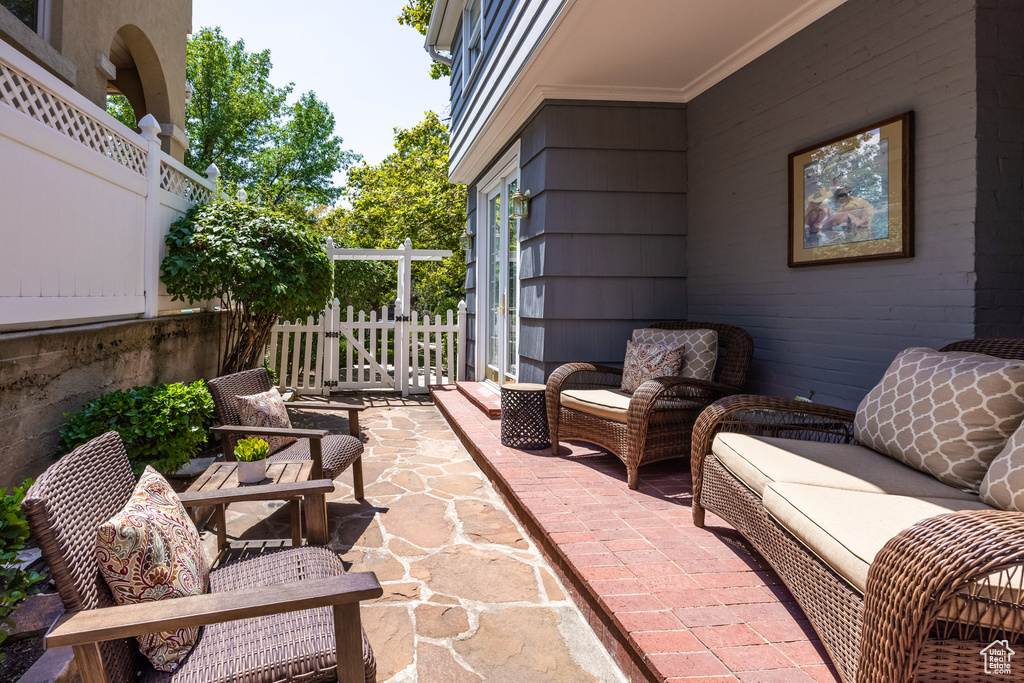 View of patio with an outdoor living space