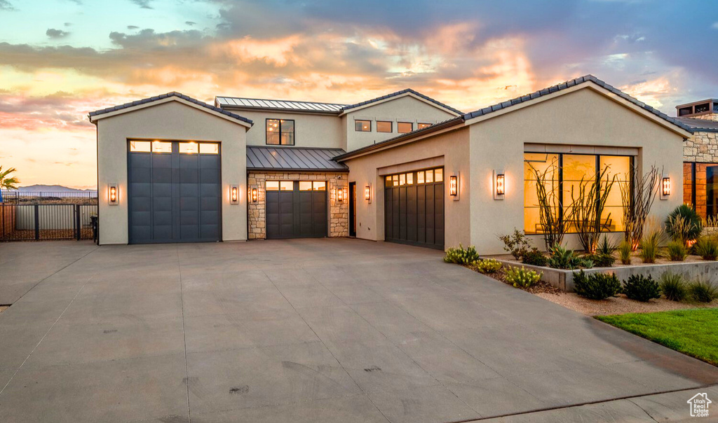 View of front of home featuring a garage