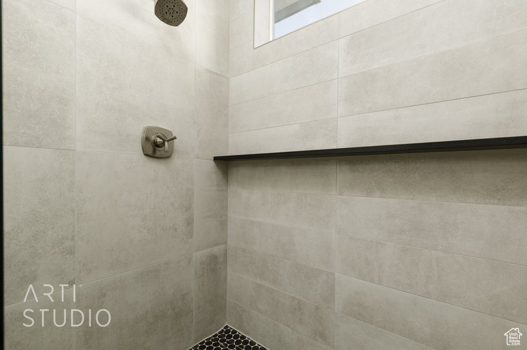 Bathroom with a tile shower