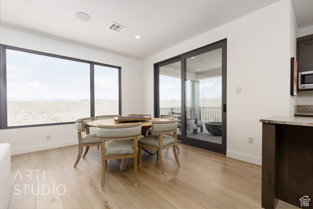 Dining room with light wood-type flooring