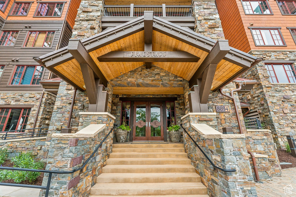 Doorway to property featuring french doors