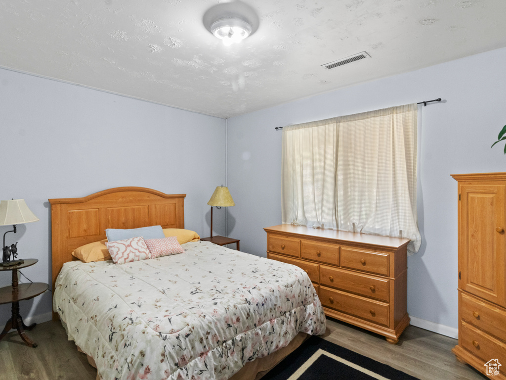 Bedroom featuring light hardwood / wood-style floors