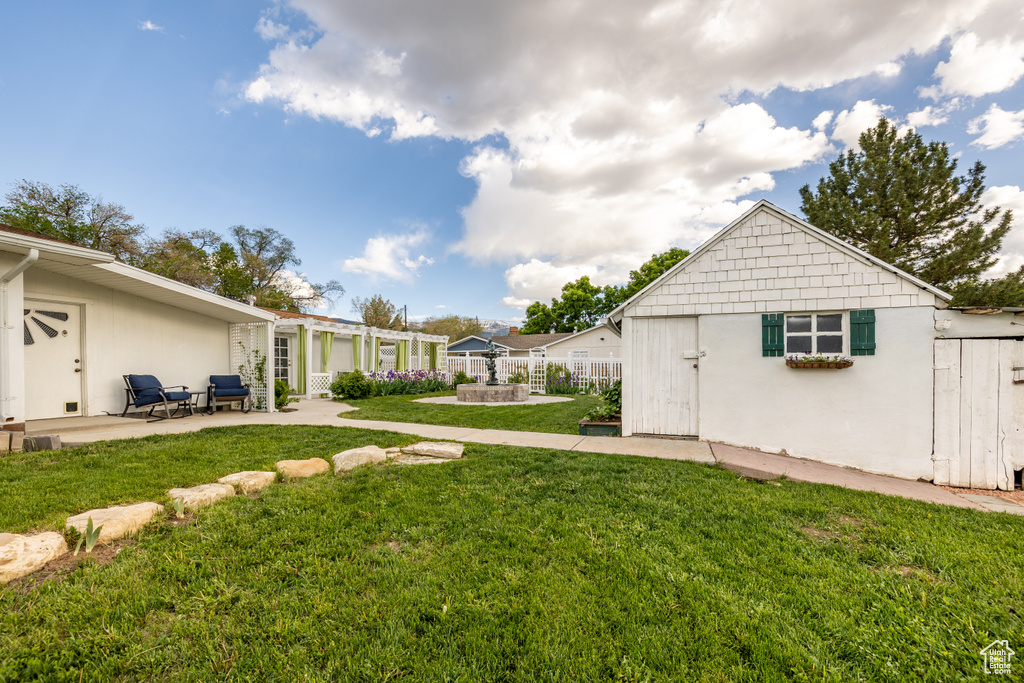 View of yard with a patio