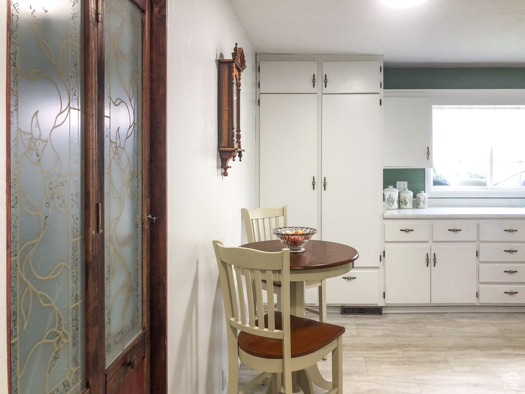 Kitchen with white cabinetry