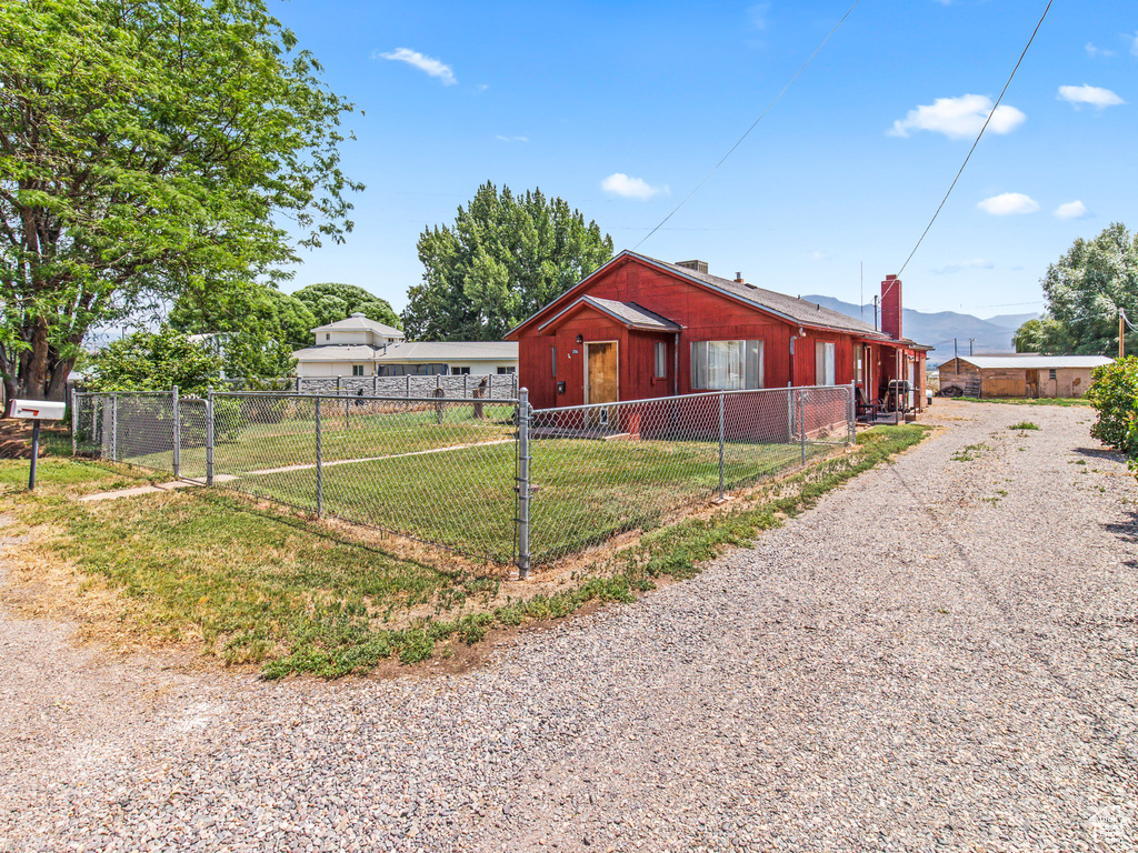 View of front of property featuring a front lawn