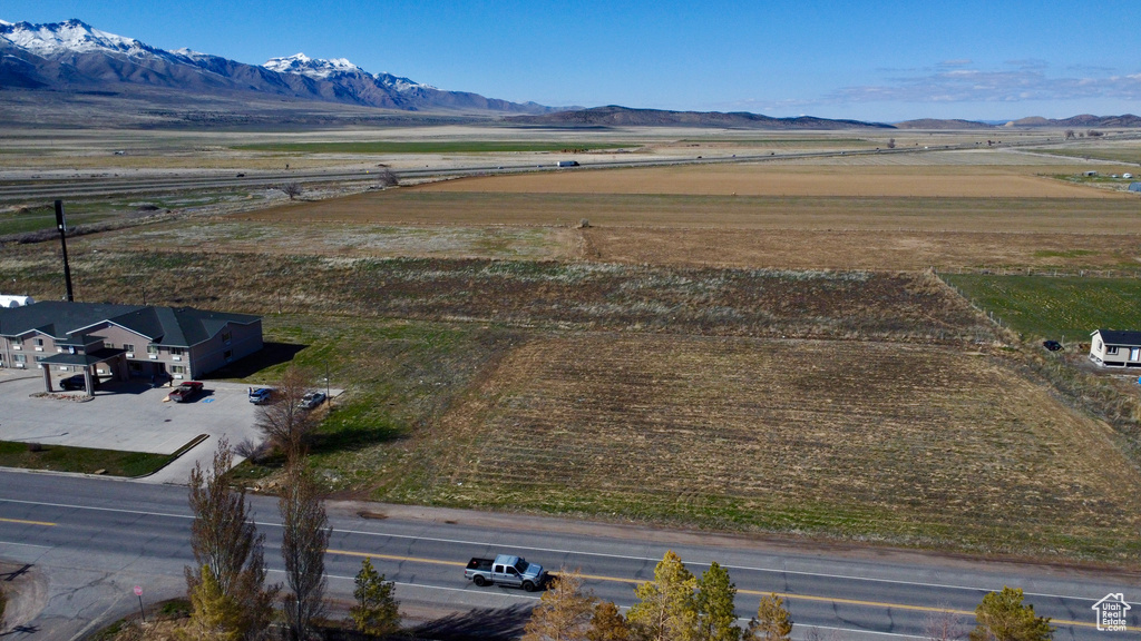 Birds eye view of property featuring a mountain view and a rural view