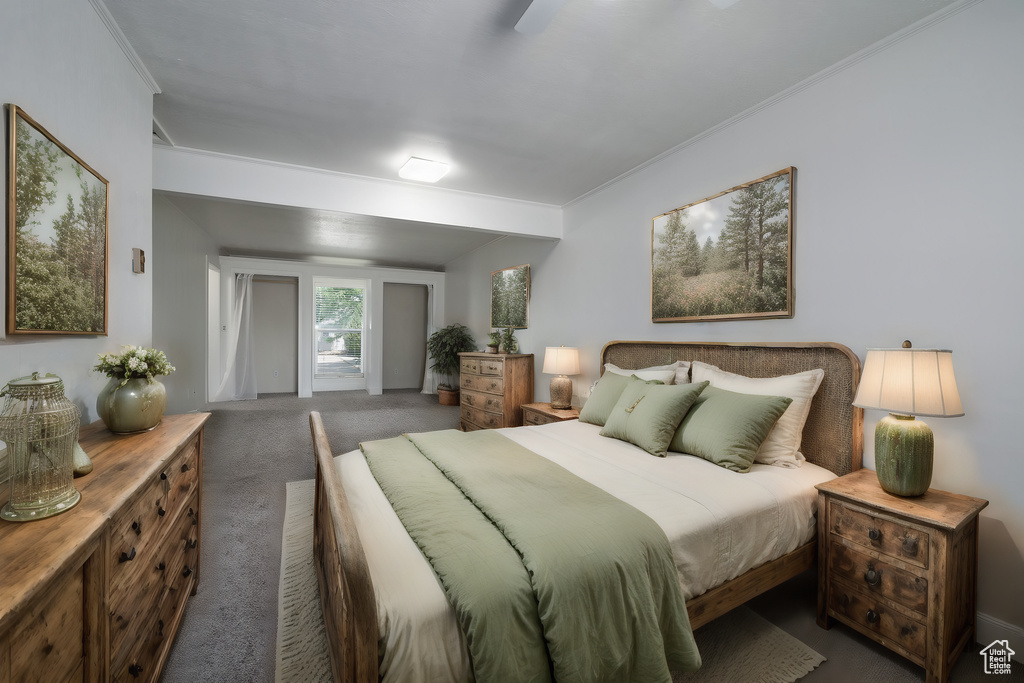 Bedroom featuring carpet floors and ornamental molding