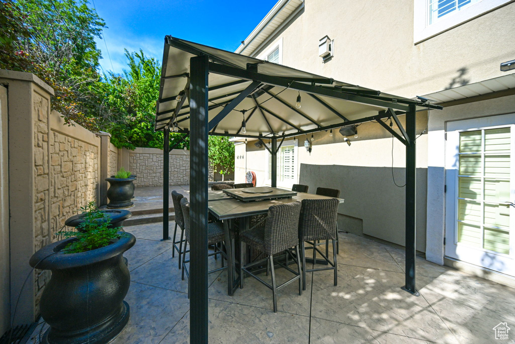 View of patio / terrace with a gazebo