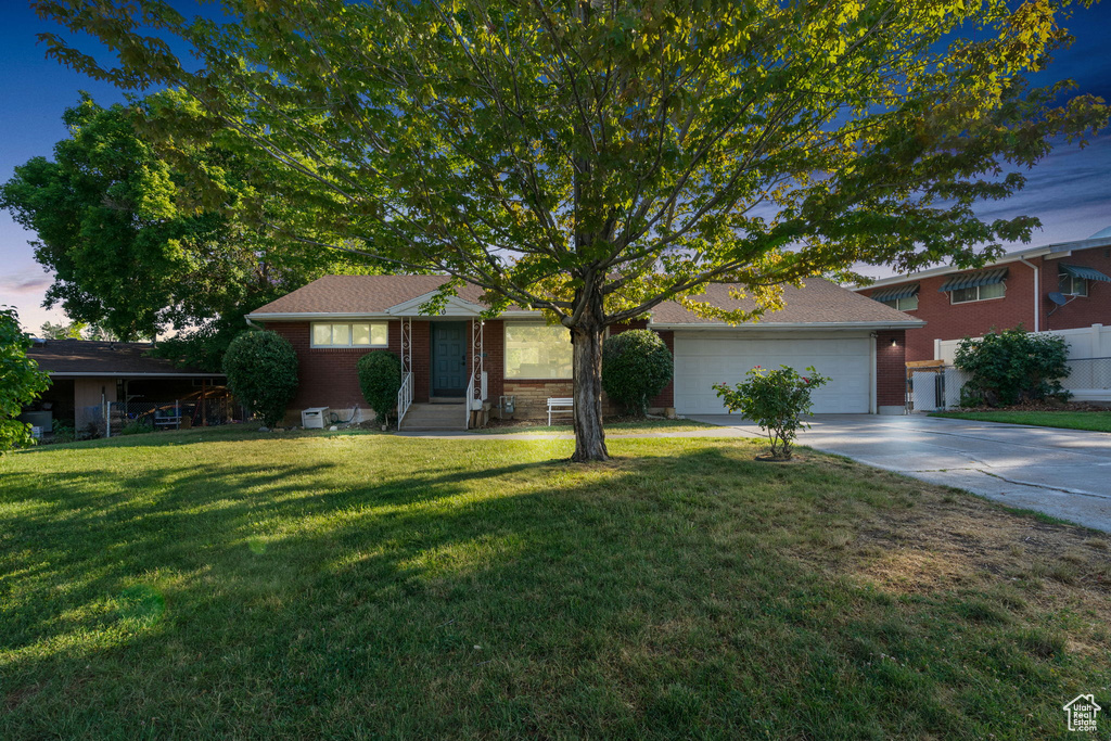 View of front of house with a front lawn