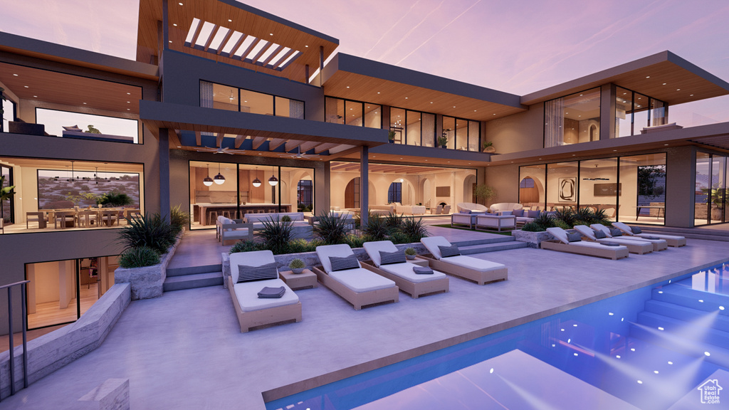 Exterior space with a balcony and an outdoor hangout area