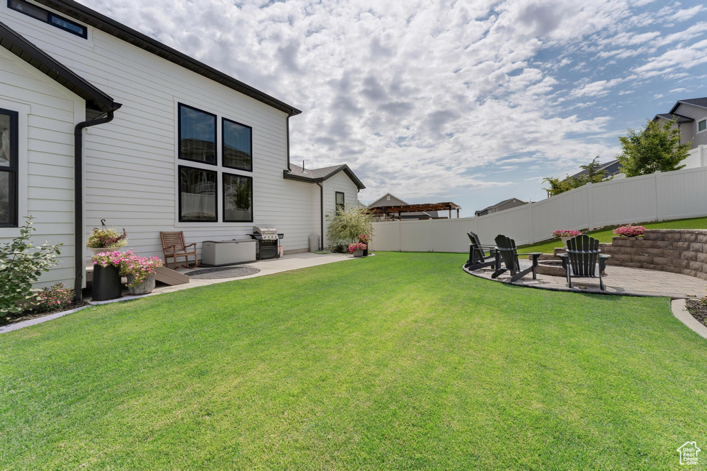 View of yard featuring a patio