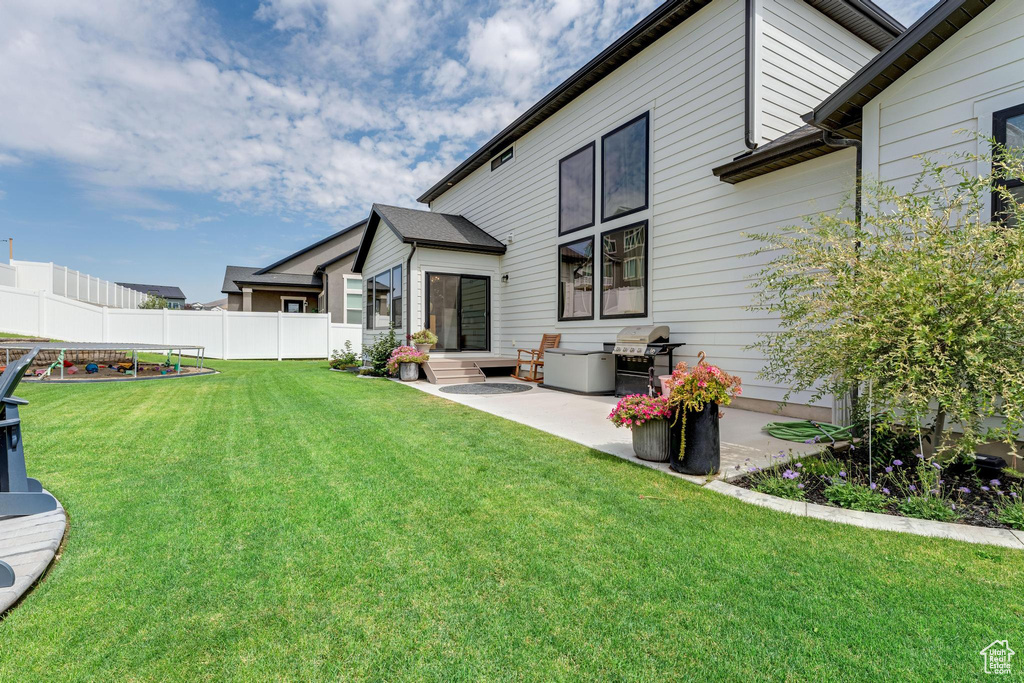 View of yard featuring a patio