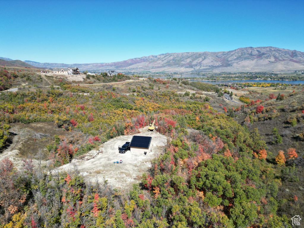 Birds eye view of property featuring a mountain view