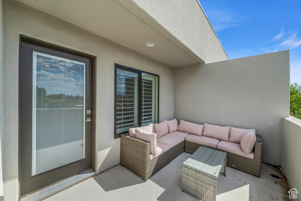 View of patio with outdoor lounge area