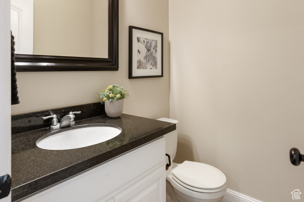 Bathroom with vanity and toilet