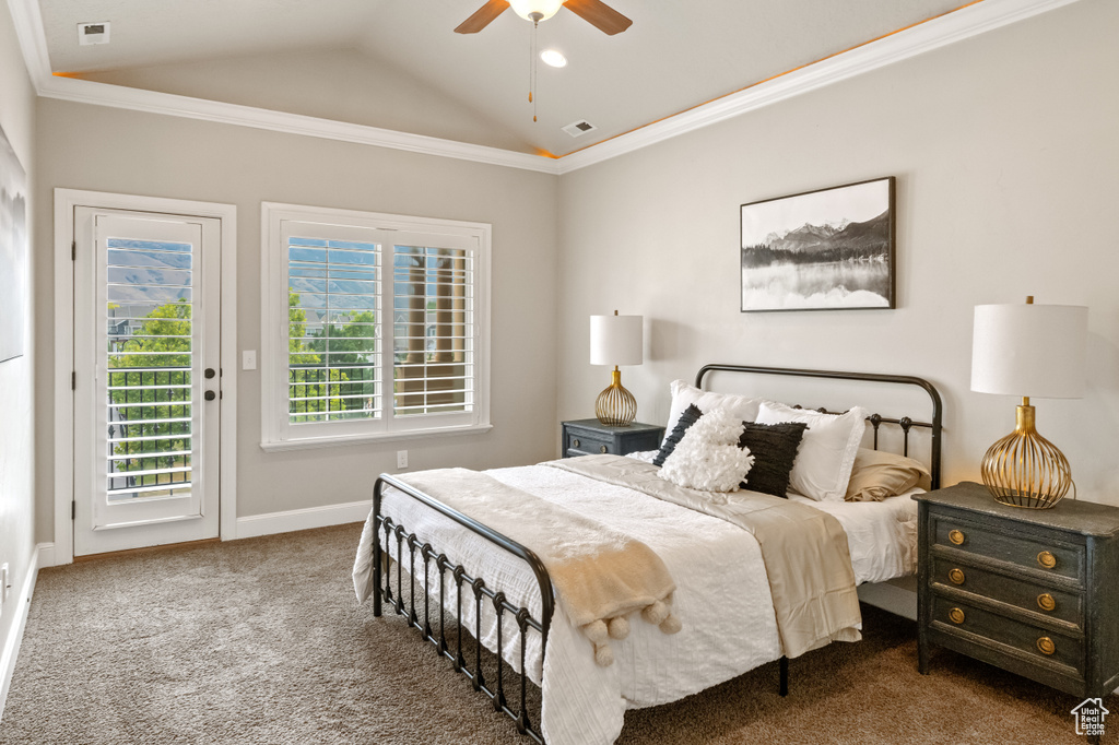 Carpeted bedroom with ornamental molding, access to outside, vaulted ceiling, and ceiling fan