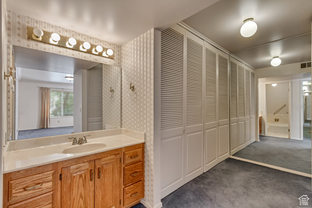 Bathroom featuring vanity