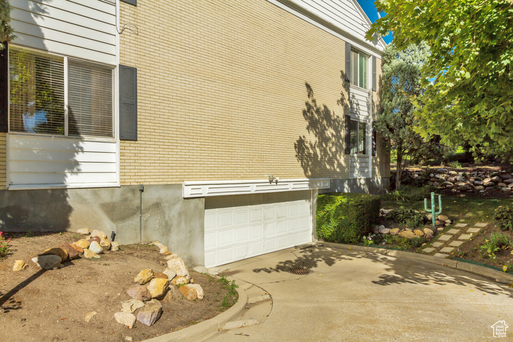 View of home's exterior with a garage