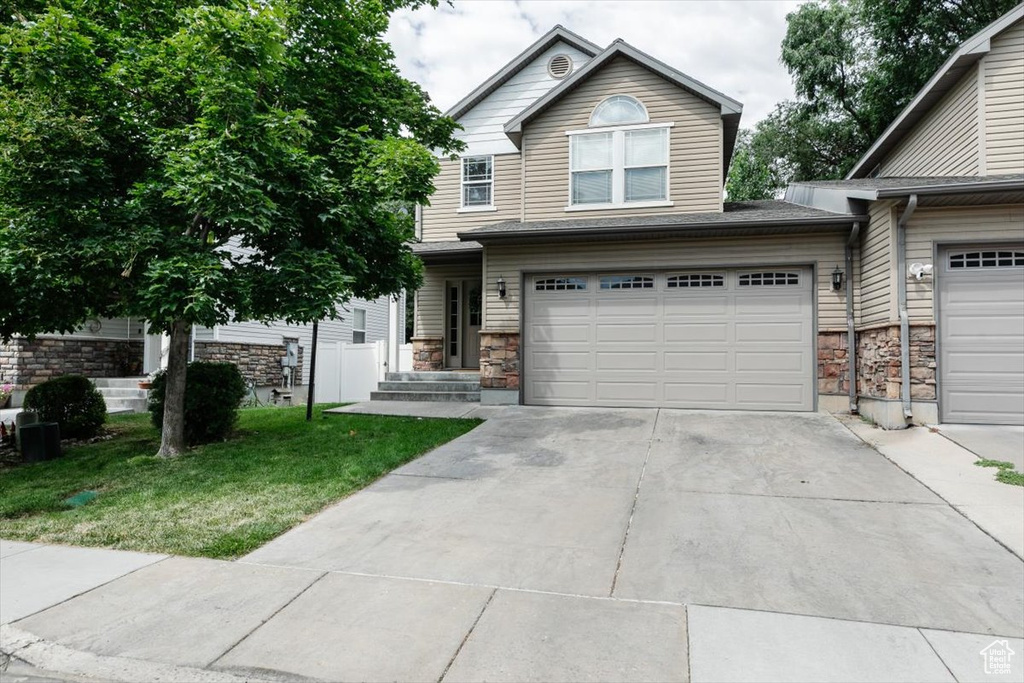 View of front facade with a garage