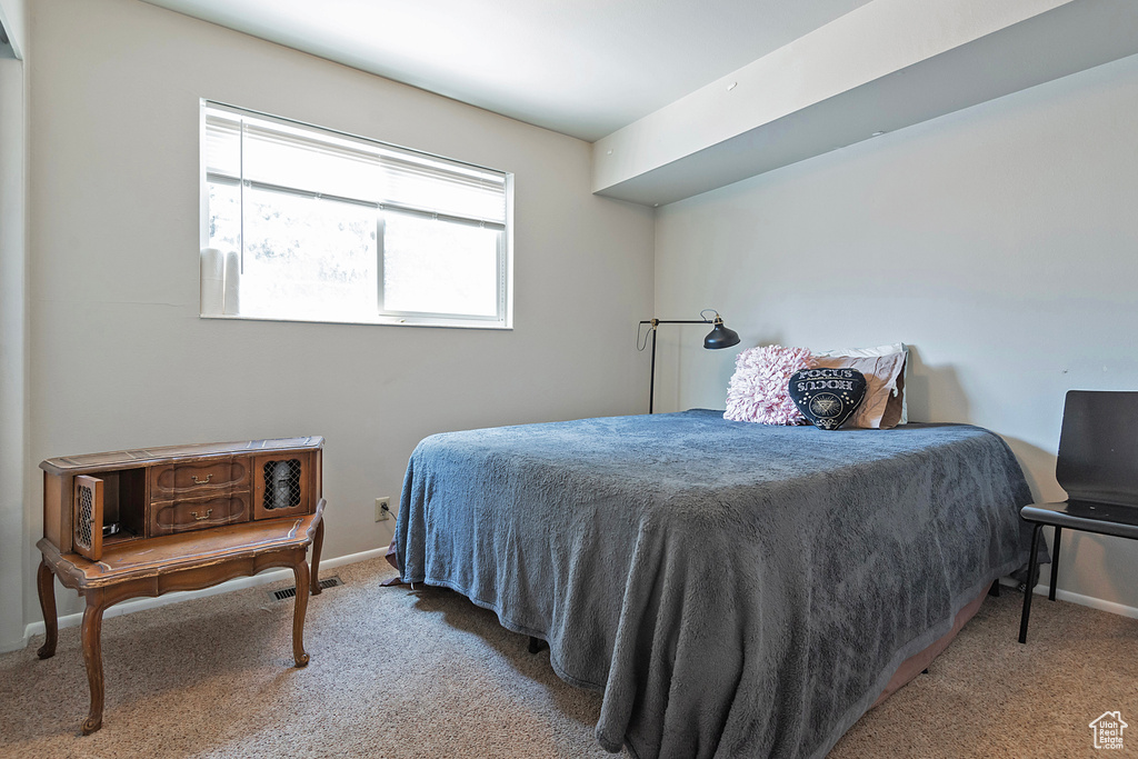 Bedroom featuring carpet floors