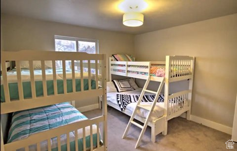 Bedroom featuring carpet flooring