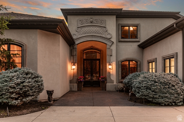 View of exterior entry at dusk