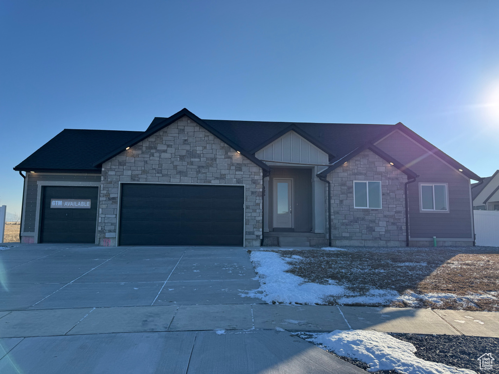 View of front of home featuring a garage