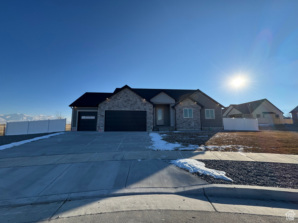 View of front of home featuring a garage