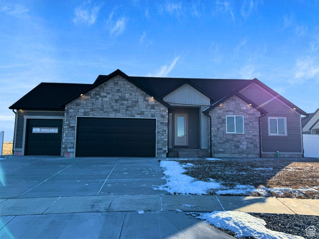 View of front of house with a garage