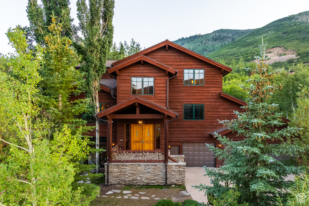 View of front of house featuring a mountain view