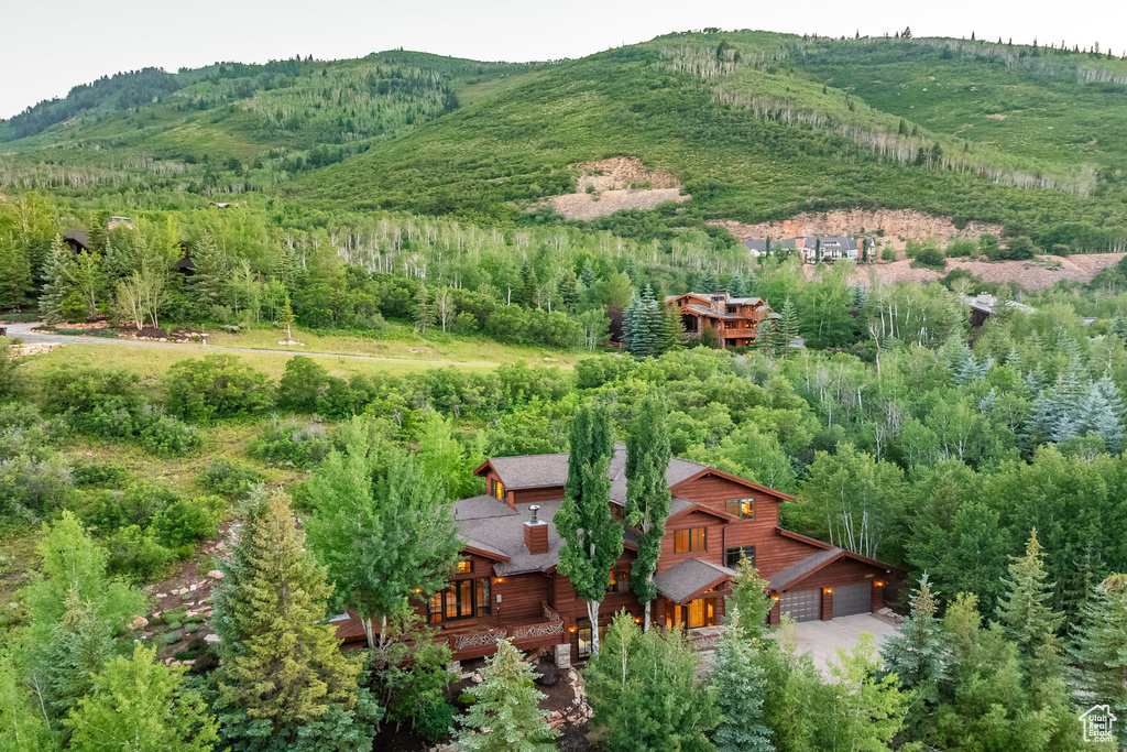 Birds eye view of property featuring a mountain view