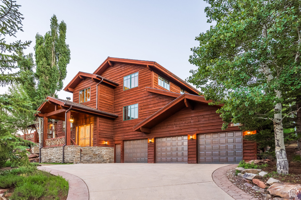 View of front of property featuring a garage