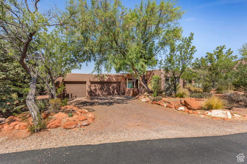 View of front of property with a garage