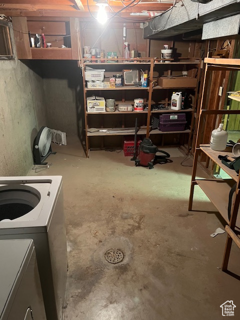 Basement with washer / clothes dryer