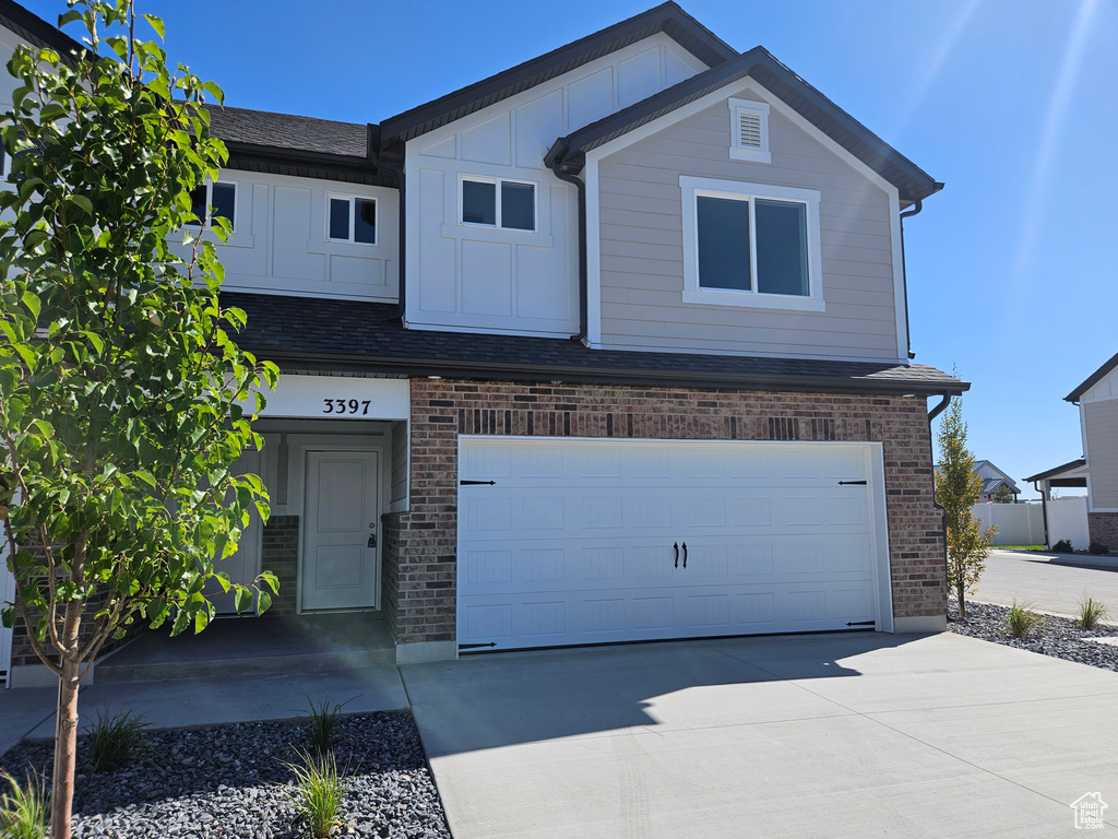 View of front facade with a garage