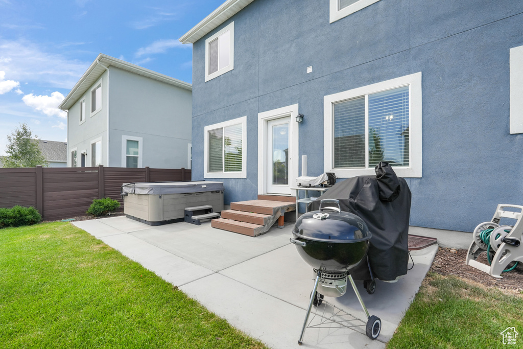 View of patio / terrace featuring a hot tub