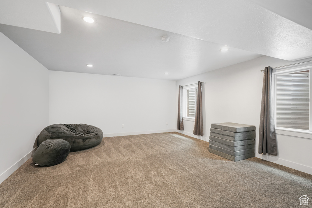 Sitting room featuring carpet