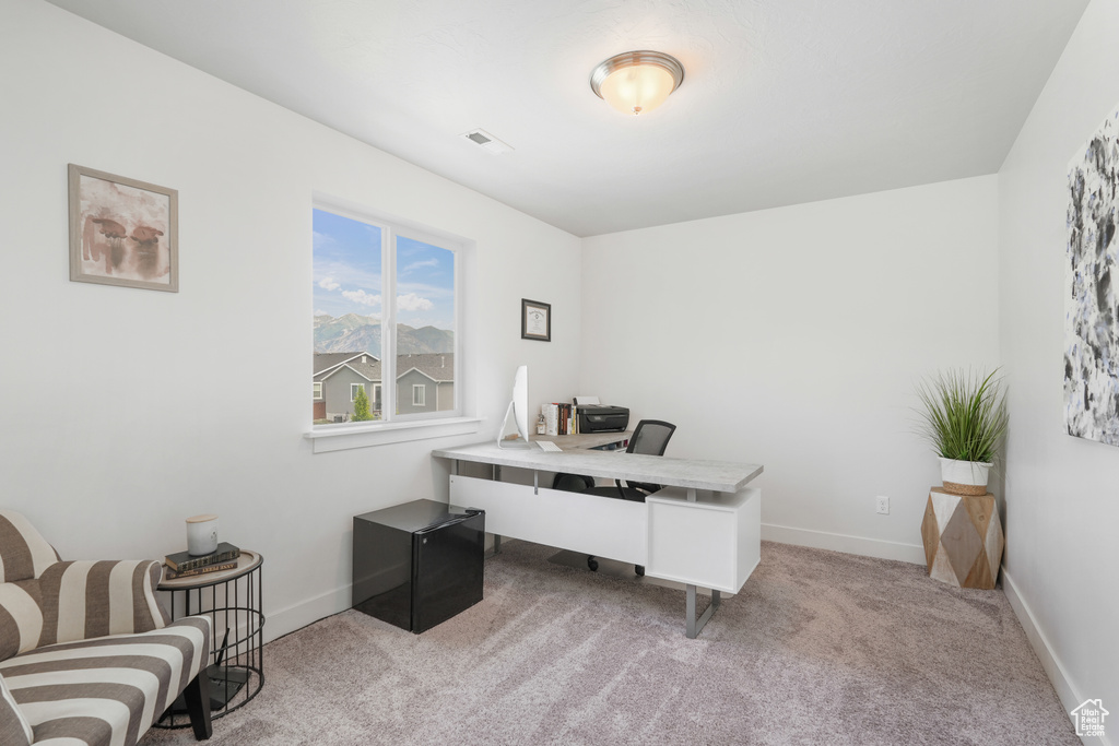 View of carpeted home office