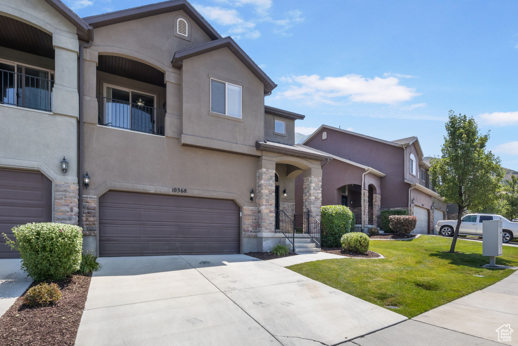 View of front of home with a garage