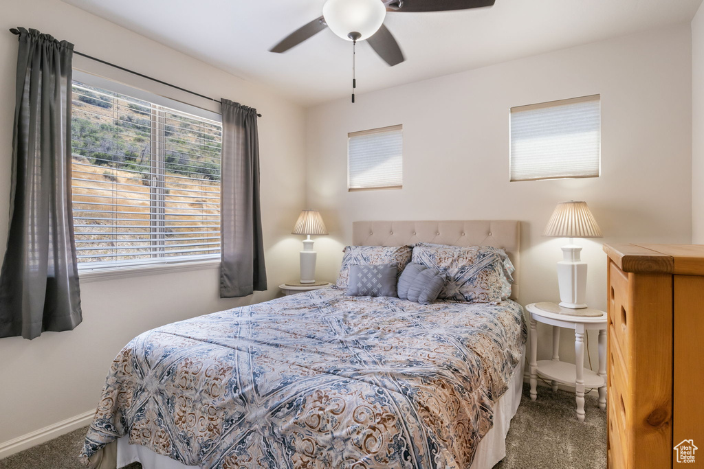 Bedroom featuring carpet flooring and ceiling fan