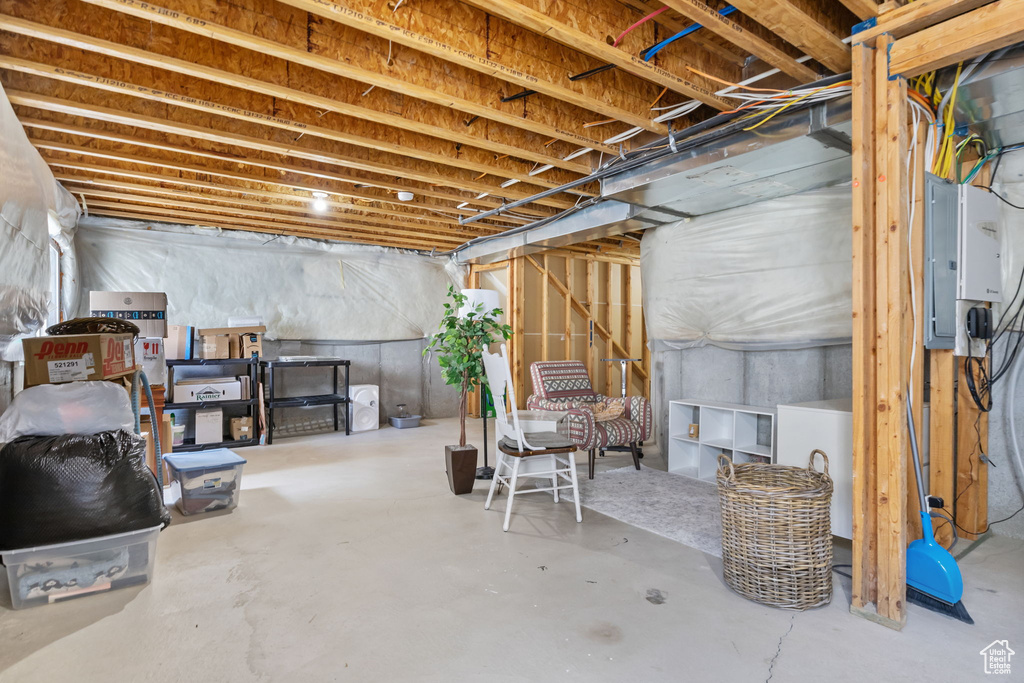 Basement featuring electric panel