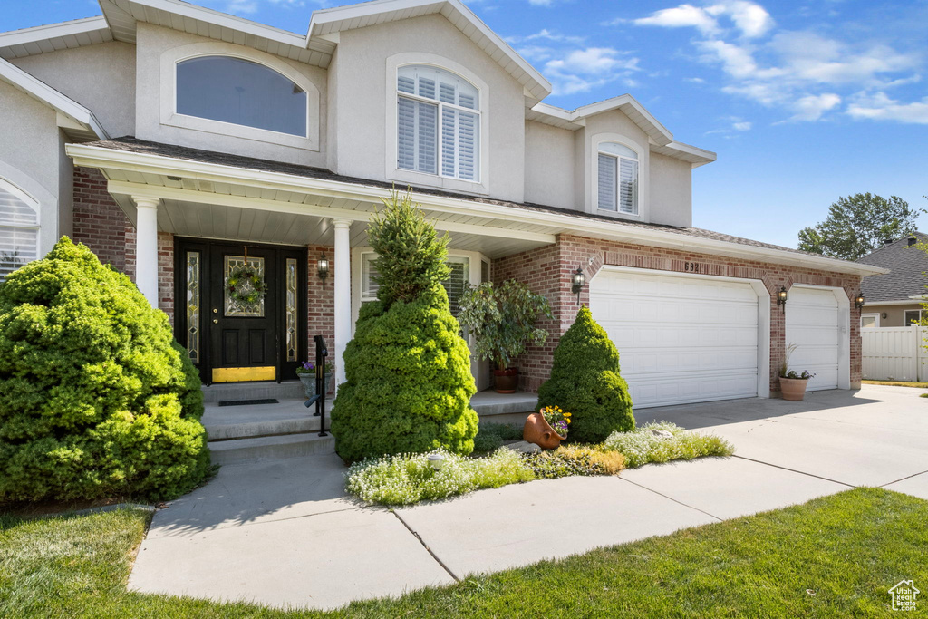 Front of property with a garage