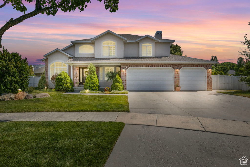 View of front property with a lawn