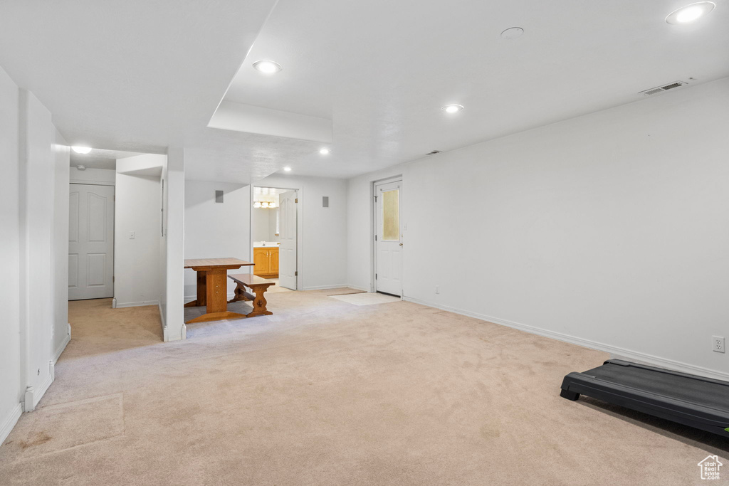 Interior space with light colored carpet