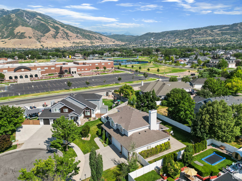 Birds eye view of property with a mountain view