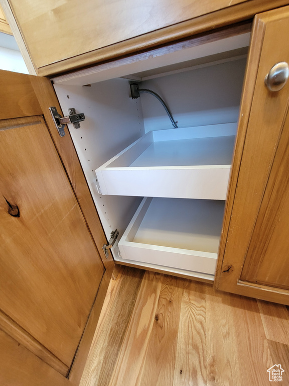 Interior details featuring hardwood / wood-style flooring