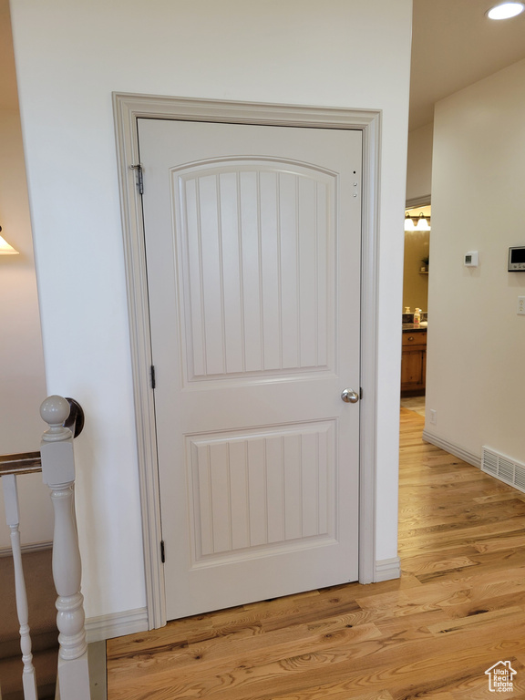 Room details with hardwood / wood-style floors