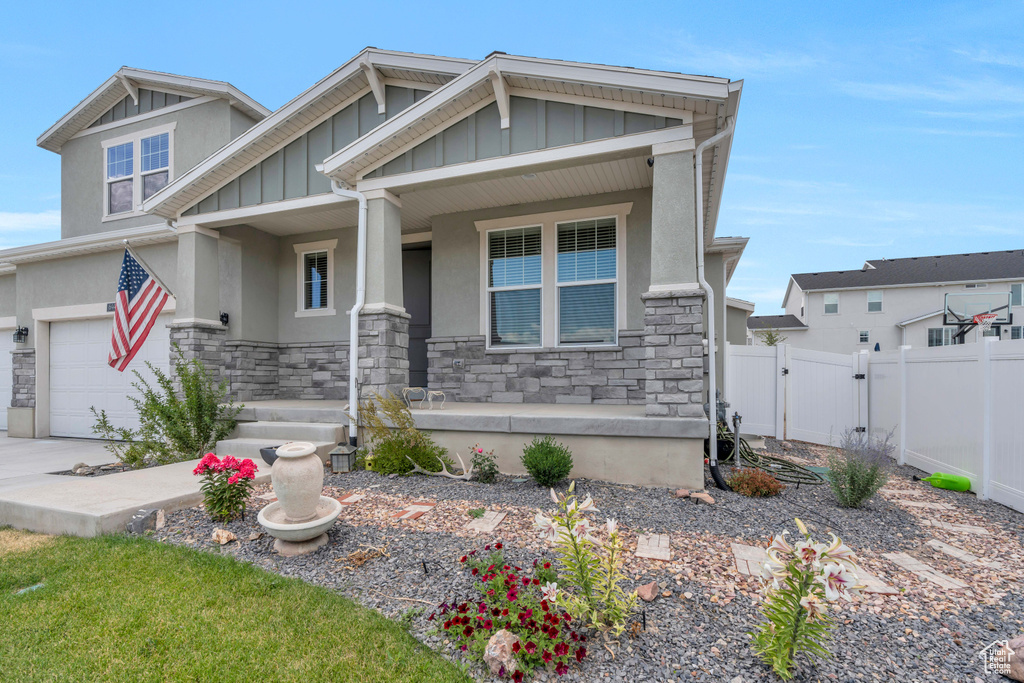 Craftsman inspired home with a garage